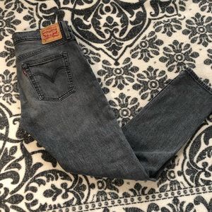 Levi’s 501 tapered black wash jeans!